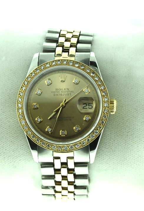 Gents Rolex Two-Tone DateJust Wristwatch 1.2ct A1: "Gents Rolex Two-Tone DateJust Wristwatch 1.2ct A1913. Excellent Condition! CE5381PF. One gents, hand crafted and machine milled Rolex two-tone DateJust model wristwatch electronically tested stainles