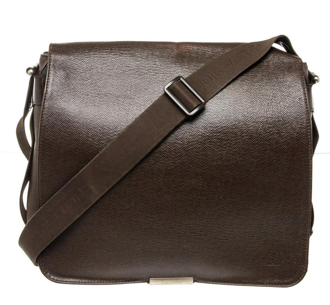Louis Vuitton Black Leather Andrei Shoulder Bag: Louis Vuitton Black Leather Andrei Shoulder Bag with leather, gold-tone hardware, trim tan vachetta leather, exterior zip pocket, interior zip pocket, shoulder strap and snap closure.