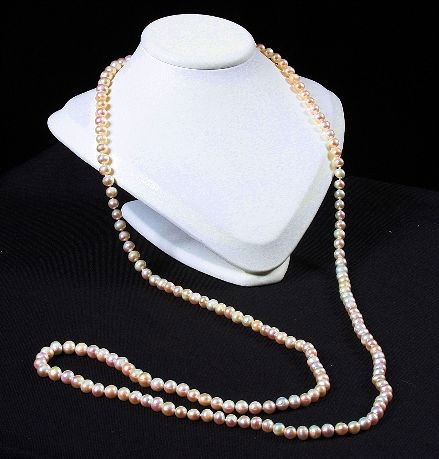 Cultured Coral Pearls 50" Pearl Necklace 7-8mm PS1: "Cultured Coral Pearls 50" Pearl Necklace 7-8mm PS13 - Excellent Condition KJ7YT - Thank you for viewing this lot. We are always adding new inventory and new auctions, so check back often. We apprecia