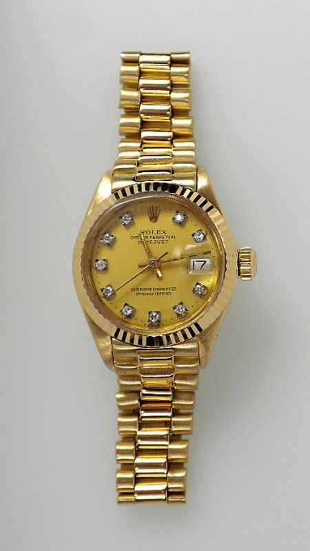 Ladies 18KT Yellow Gold Rolex DateJust Wristwatch A2002: "Ladies 18KT Yellow Gold Rolex DateJust Wristwatch A2002. Excellent Condition! NC1093RX. One ladies, hand crafted & machine milled Rolex Lady President, and DateJust model wristwatch electronically te