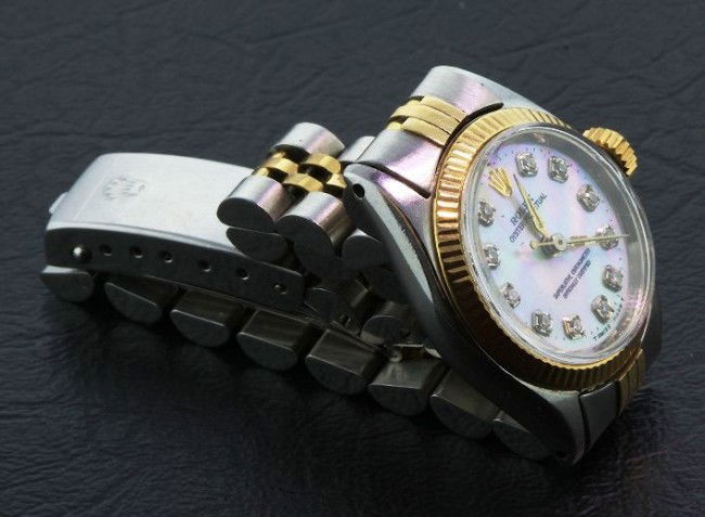 Lady Rolex Two-Tone Oyster Perpetual Wristwatch A367: "Lady Rolex Two-Tone Oyster Perpetual Wristwatch A367. Excellent Condition! XZ1061HD One ladies, handcrafted & machine milled Rolex Oyster perpetual model Stainless Steel and 14KT yellow gold wristwat