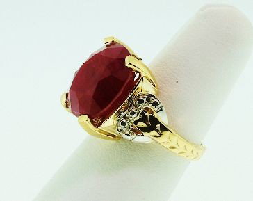14KT Yellow Gold Ladies Ruby Solitaire Ring A628: "14KT Yellow Gold Ladies Ruby Solitaire Ring A628 Excellent Condition! One 14KT yellow gold ladies cast ruby solitaire ring. Good workmanship. The featured ruby is supported by a yellow gold lattice u