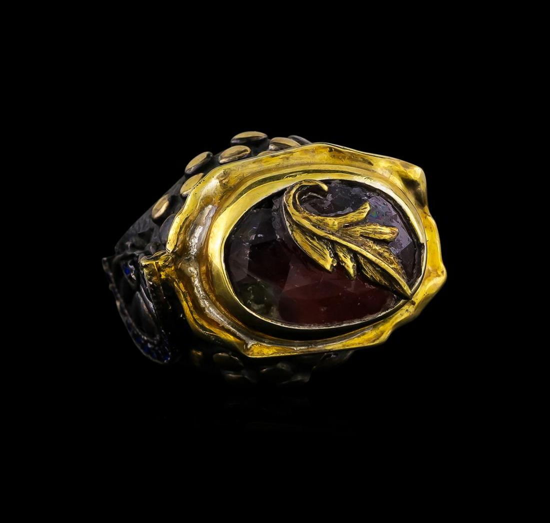 Sterling Silver Ring: One of a kind high fashion sterling silver Ring weighing 20 grams. Black Antique texture. Containing: Quartz Crystal. This sterling silver promises a lasting shine.