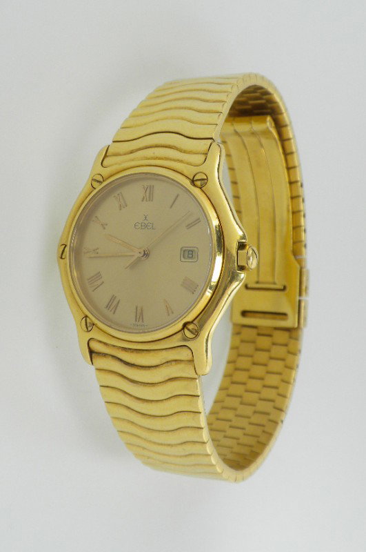 Ebel 18KT Gold Sport Classic Wave Wristwatch A1644: "Ebel 18KT Gold Sport Classic Wave Wristwatch A1644. Excellent Condition! NG1063SZ. One, custom crafted & machine milled Ebel 18KT yellow gold Sport Classic Wave wristwatch electronically tested. Move