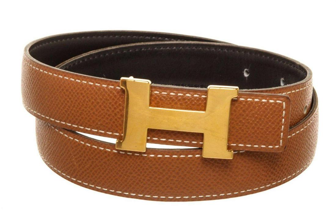 Hermes Brown Leather Constance Belt: Hermes Brown Leather Constance Belt with material leather, gold-tone hardware and push lock closure.