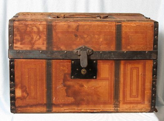 Antique Trunk Doll by the M.C. Tilley & Co. Corral6: "Antique Trunk Doll by the M.C. Tilley & Co. Corral6. Excellent Vintage Condition! MB101LK. Here we have a great looking doll trunk from the 1800's. It is adorned with a beautiful sticker on the insid
