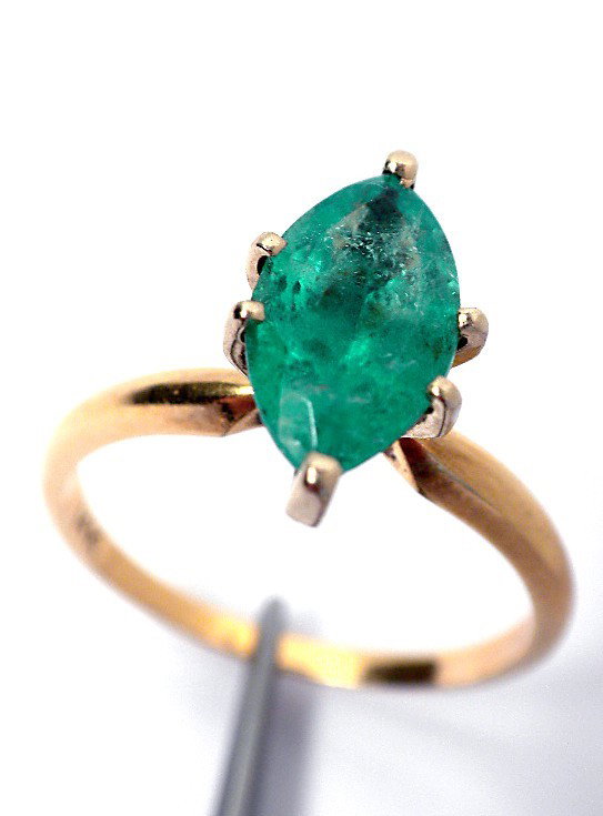 14KT Yellow Gold Ladies Emerald Solitaire Ring. A1311: "14KT Yellow Gold Ladies Emerald Solitaire Ring. A1311. Excellent Condition! One electronically tested 14KT yellow gold ladies cast emerald solitaire ring with a bright polish finish. Identified with 