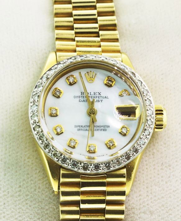 Ladies 18KTY Gold Rolex Diamond DateJust Wristwatch A22: "One ladies hand crafted & machine milled Rolex DateJust model the Lady President wristwatch electronically tested 18KT yellow gold, Circa: 1963, Case: 25mm oyster, Crown: twinlock, Bezel: custom diam