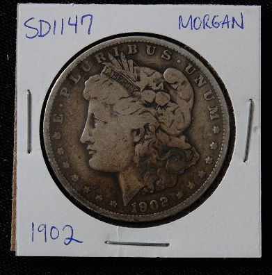 1902 Morgan Silver Dollar SD1147: 1902 Morgan Silver Dollar SD1147 - AE817D - Thank you for bidding on this item. We appreciate your business. Be sure to check out all of the upcoming auctions offered by Seized Assets Auctioneers!