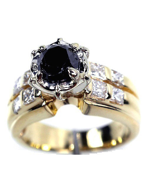 14KT Yellow Gold Black & White Diamond Ring A1614: 14KT Yellow Gold Black & White Diamond Ring A1614. Excellent Condition! One electronically tested 14KT yellow gold ladies cast black and white diamond ring with a bright polish finish. The featured bl