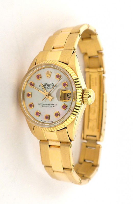 Ladies 18KT Gold Rolex DateJust Wristwatch A2273: Ladies 18KT Gold Rolex DateJust Wristwatch A2273. Good Condition. TR1634PL. One ladies, hand crafted & machine milled Rolex DateJust model wristwatch electronically tested 18KT yellow gold, Circa: 197