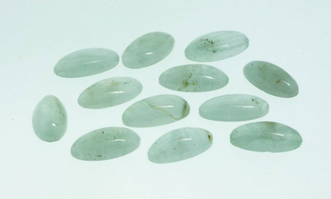 Natural Green Beryl Parcel (12) 35.72cts. A2282: Natural Green Beryl Parcel (12) 35.72cts. A2282. Excellent Condition. Twelve oval cabochon cut natural Green Beryls. Exact total weight: 35.72cts. AIG appraised at $1,300.00. TW13NY. Thank you for vie