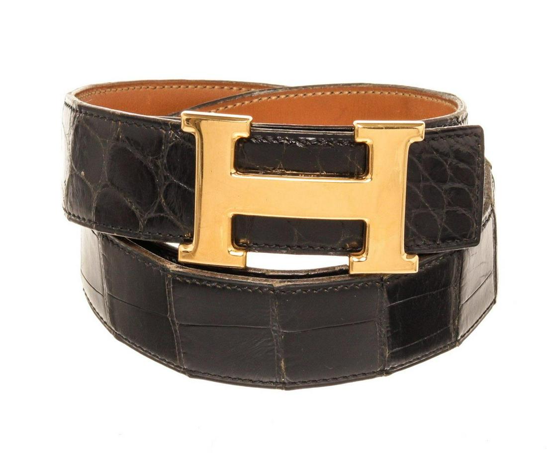 Hermes Black Leather Constance Belt: Hermes Black Leather Constance Belt with leather, gold-tone hardware and push lock closure.
