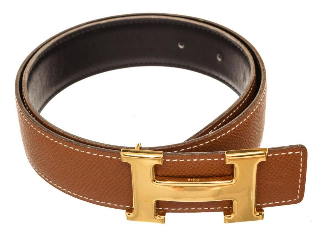 Hermes Brown Leather Constance Belt: Hermes Black Leather Constance Belt with leather, gold-tone hardware and push lock closure.