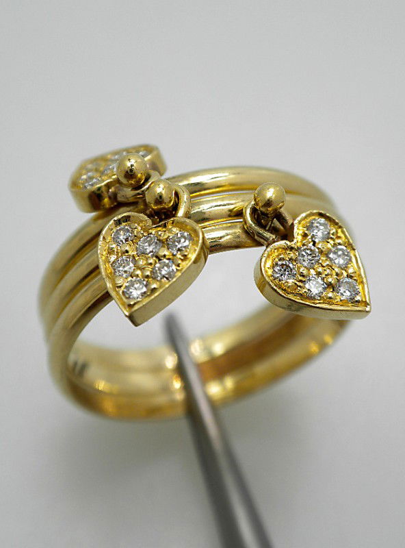 14KT Yellow Gold Stackable Diamond Rings A2367: "14KT Yellow Gold Stackable Diamond Rings A2367. Good Condition! LP861OJ. Three electronically tested 14KT yellow gold ladies cast and assembled diamond stackable rings. Condition is good. Each stacka