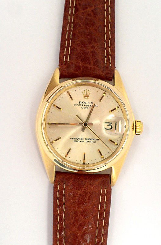 Gents Rolex 18KT Gold Date Model Wristwatch A2320: "Gents Rolex 18KT Gold Date Model Wristwatch A2320. Excellent Condition! JH1252PJ. One gents, custom cast & assembled Rolex Date wristwatch electronically tested 18KT yellow gold, Case: 34mm oyster, C