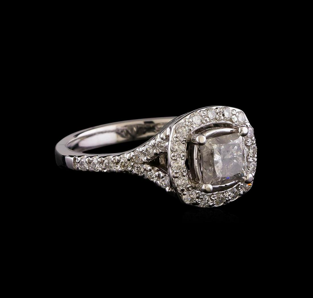 1.23 ctw Diamond Ring - 14KT White Gold: One electronically tested 14KT white gold lady's cast wedding ring with a split shank halo with a bright polish finish. The featured lady's ring has a shank measuring 2.24 millimeters wide. Identified