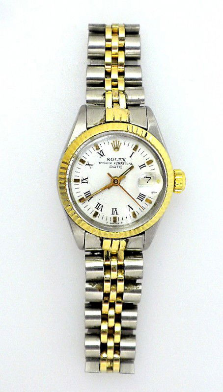 Lady Rolex Two-Tone Date Model Wristwatch A2322: "Lady Rolex Two-Tone Date Model Wristwatch A2322. Excellent Condition! XW1261HZ. One ladies, hand crafted & machine milled Rolex Date Model Stainless Steel & 14KT yellow gold wristwatch electronically