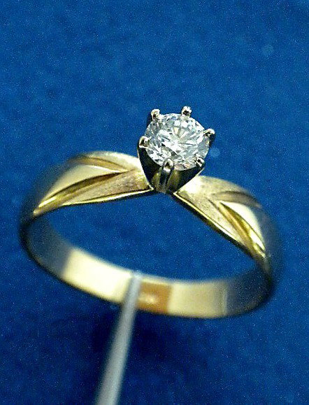 14KT Yellow Gold Diamond Solitaire Ring A2471: "14KT Yellow Gold Diamond Solitaire Ring A2471. Good Condition! IX901NJ. One electronically tested 14KT yellow gold ladies cast diamond solitaire ring with a bright finish. Condition is good. Identifi
