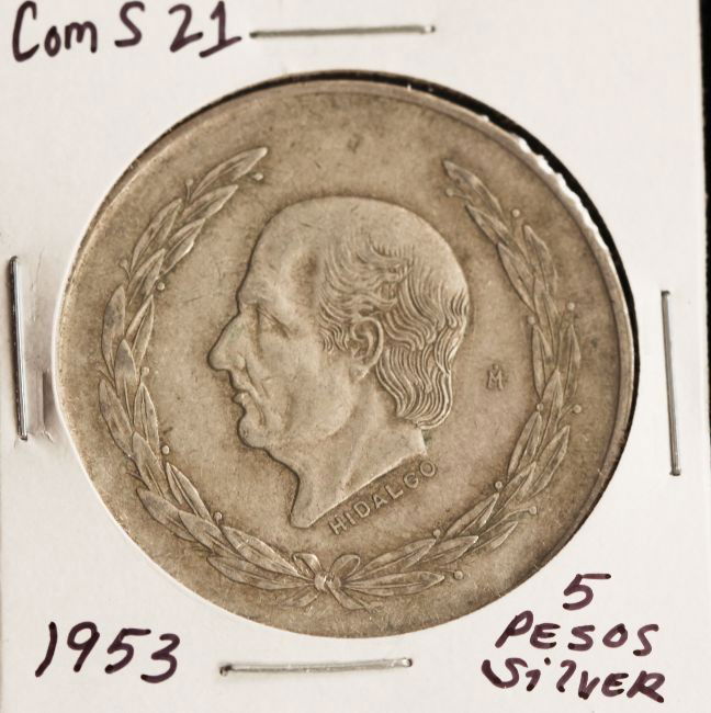 1953 Hidalgo Cinco Pesos Silver Coin COMS21: "1953 Hidalgo Cinco Pesos Silver Coin COMS21. As-Is Condition! PR81SD. 1953 Hidalgo Cinco Pesos Silver Coin. 27.6 grams of Silver. Thank you for viewing this lot. We are always adding new inventory an