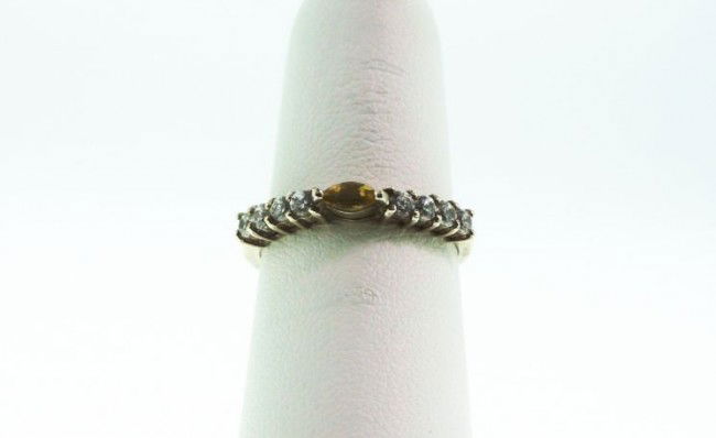 Sterling Silver Citrine and Diamond Ring GD136: "Sterling Silver Citrine and Diamond Ring GD136. Good Condition! JG84OT. One sterling silver citrine and diamond ring. Identified with markings of "925". Total weight of diamonds: 0.75ct. Total weight