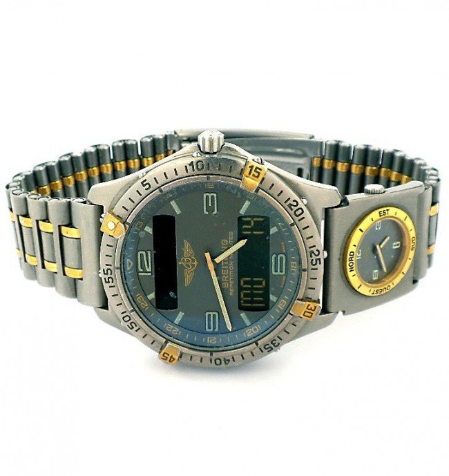 Breitling Analog/Digital Aerospace Wristwatch NS116: "Breitling Analog/Digital Aerospace Wristwatch NS116. Good Condition! LF106VI. One gentlemans custom Breitling Titanium Aerospace wristwatch. Bi-directional with 18KT yellow gold stations this Breitli