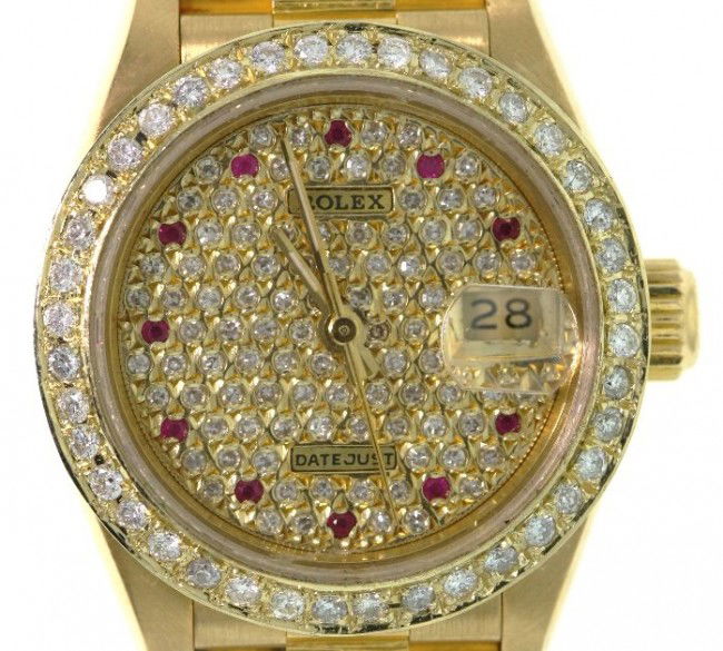 Ladies 18KT Gold Rolex Diamond DateJust Wristwatch A267: "Ladies 18KT Gold Rolex Diamond DateJust Wristwatch A2673. Excellent Condition! JE1585OM. One ladies, hand crafted and machine milled Rolex DateJust model the Lady President wristwatch electronically