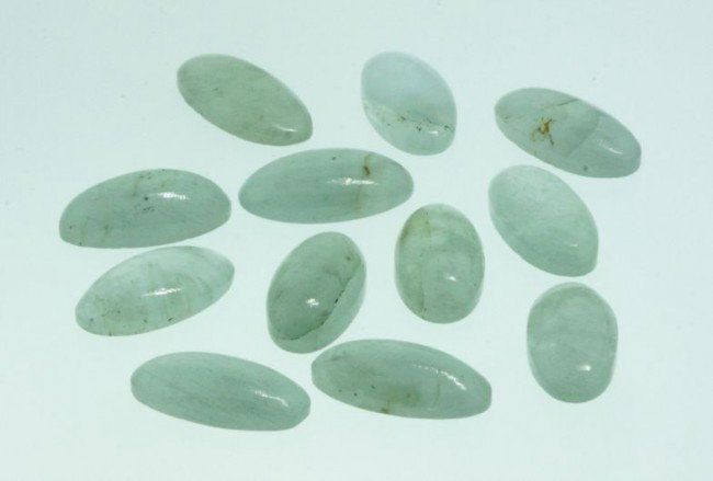Natural Green Beryl Parcel (12) 35.15cts. A2283: "Natural Green Beryl Parcel (12) 35.15cts. A2283. Excellent Condition. RT13MZ. Twelve oval cabochon cut natural Green Beryls. Exact total weight: 35.15cts. AIG appraised at $1,285.00. NH13KL. Thank yo