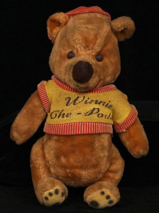 Vintage "Winnie the Pooh" Disney Gund ED817: Vintage Winnie the Pooh" Disney Gund ED817. Excellent Vintage Condition! GA66FJ. Vintage and highly collectible DISNEY "Winnie the Pooh" plush toy circa 1960. Tag reads: Winnie the Pooh © Walt Disney