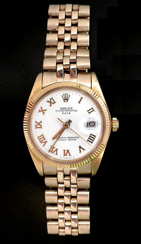 Gents Rolex 14KT Gold Date Model Wristwatch A2726: "Gents Rolex 14KT Gold Date Model Wristwatch A2726. Excellent Condition! IF9383UY. One, hand crafted and machine milled Rolex Date Model wristwatch electronically tested 14KT yellow gold, Case: 34mm o