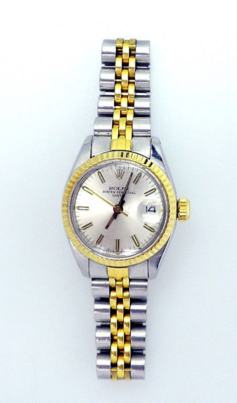 Lady Two-Tone Rolex Date Model Wristwatch A2711: Lady Two-Tone Rolex Date Model Wristwatch A2711. Excellent Condition! FE6371TL. One ladies, hand crafted and machine milled Rolex Date Model stainless steel and 18KT yellow gold wristwatch electronica