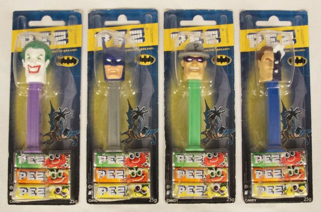 Collection of 4 Batman PEZ Dispensers & Candy ED943: "Collection of 4 Batman PEZ Dispensers & Candy ED943. As-Is Condition! LW4CI. Collection of 4 Batman PEZ dispensers and candy. Included are "Batman", "Riddler", "Joker", and "Two-Face" introduced in 2