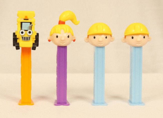 Lot of 4 Bob the Builder PEZ Dispensers ED935: "Lot of 4 Bob the Builder PEZ Dispensers ED935. As-Is Condition! NS4FS. Lot of 4 Bob the Builder PEZ dispensers & candy. Included are 1 "Wendy", 2 "Bob the Builder", introduced in 2002. And 1 "Scoop"