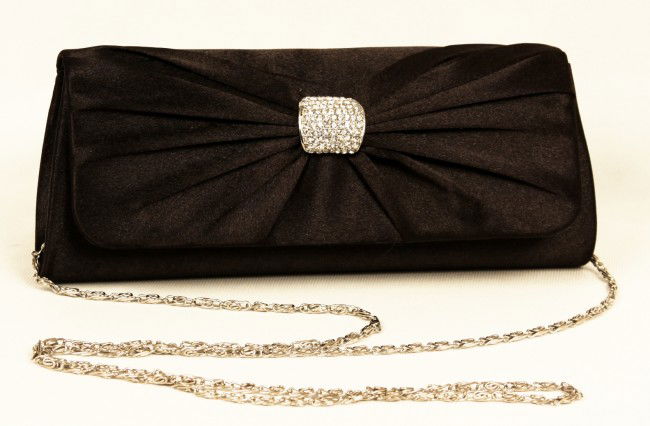 Black Evening Purse RTB22: "Black Evening Purse RTB22. Great Condition! WA6LZ. One black evening purse measuring 4" tall X 9" length X 2" width. Diamond studded bow on the front with 42" silvered chain strap. Comes with polyest