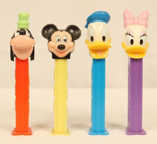 Lot of 4 Walt Disney PEZ Dispensers ED942: "Lot of 4 Walt Disney PEZ Dispensers ED942. Excellent Vintage Condition! DF4GS. Lot of 4 Walt Disney PEZ dispensers. Included are "Daisy Duck", "Goofy", & "Donald Duck" introduced in 1997 and a 1989 "