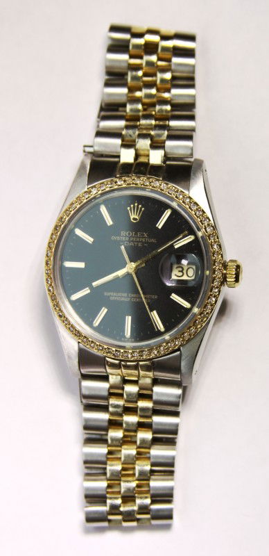 Gents Rolex Two-Tone Date Model Wristwatch 0.56ct A2749: "Gents Rolex Two-Tone Date Model Wristwatch 0.56ct A2749. Excellent Condition! PA3102AJ. One gents, hand crafted & machine milled Rolex Date Model wristwatch electronically tested 14KT yellow gold and