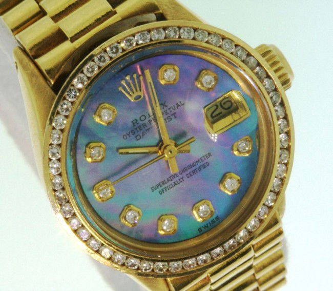 Ladies 18KT Gold Rolex Diamond DateJust Wristwatch A267: Ladies 18KT Gold Rolex Diamond DateJust Wristwatch A2672. Excellent Condition! FM1544HJ. One ladies, hand crafted and machine milled Rolex DateJust model the Lady President wristwatch electronically t