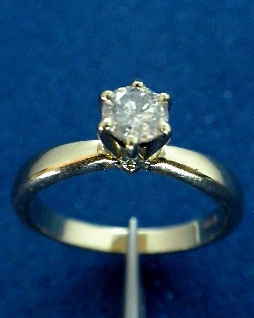 14KT Yellow Gold Diamond Solitaire Ring A2468: 14KT Yellow Gold Diamond Solitaire Ring A2468. Good Condition! LQ131RG. One electronically tested 14KT yellow gold ladies cast diamond solitaire ring with a bright polish finish. Condition is good. Id