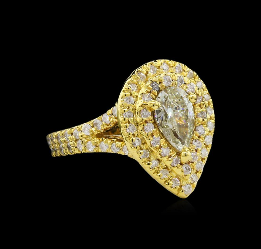 2.09 ctw Diamond Ring - 14KT Yellow Gold: One electronically tested 14KT yellow gold lady's cast wedding ring with a split shank double halo with a bright polish finish. The featured lady's ring has a shank measuring 3.30 millimeters wide. Id