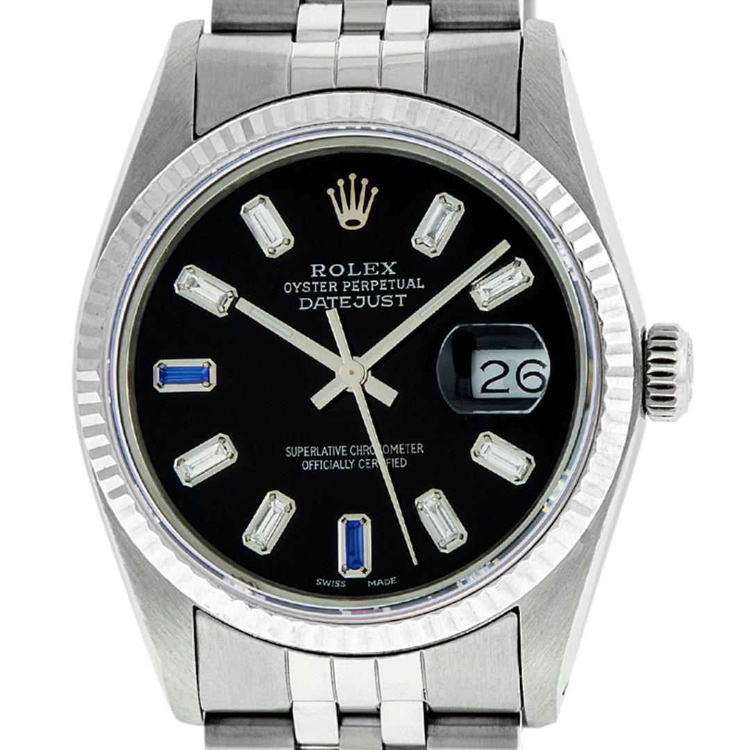 Rolex Mens Stainless Steel 36mm Black Diamond Dial Datejust Wristwatch: One Mens Stainless Steel Rolex Datejust Polished Bright with Satin Finish, Serviced & Electronically Tested, Stainless Steel Case: 36mm, Stainless Steel Crown, Bezel: 14K White Gold Fluted Bezel. Cust