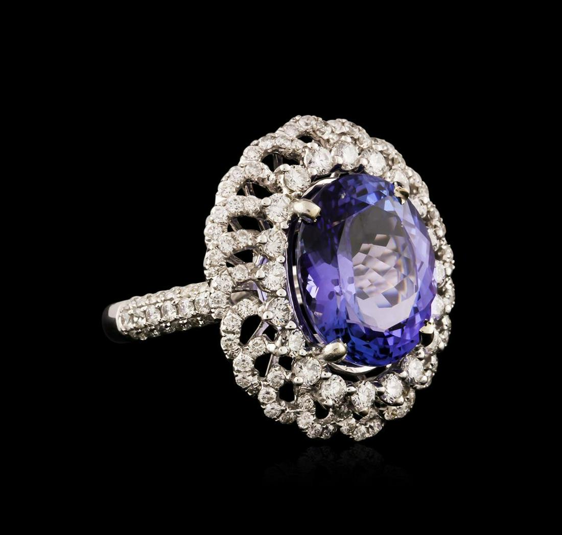 18KT White Gold 9.02 ctw Tanzanite and Diamond Ring: One electronically tested 18KT white gold ladies cast tanzanite and diamond ring with a bright polish finish. Identified with markings of "18K". Condition is new. Containing: One prong set oval modifi