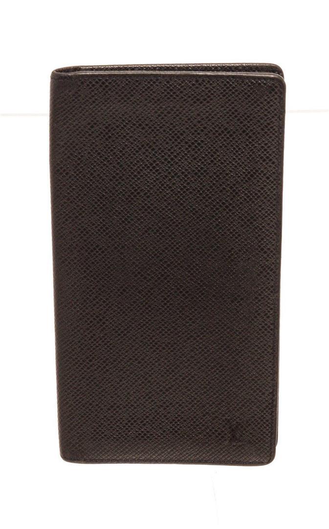 Louis Vuitton Black Leather Long Card Wallet: Louis Vuitton Black Leather Long Card Wallet with material leather, gold-tone hardware, interior card holder pockets, trim tan vachetta leather, flap closure. Measurements: Length 6.5 in / 17 cm Width