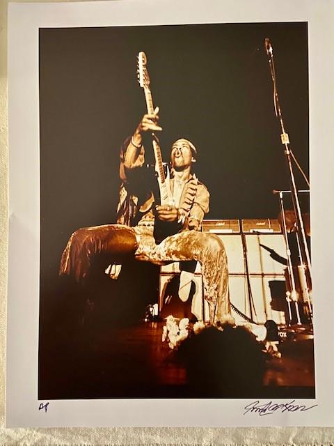 Jimi Hendrix by Robert Knight: The man and the guitar. Jimi Hendrix circa 1972 by famed photographer Robert Knight. 14x11 colorized signed & numbered print.
