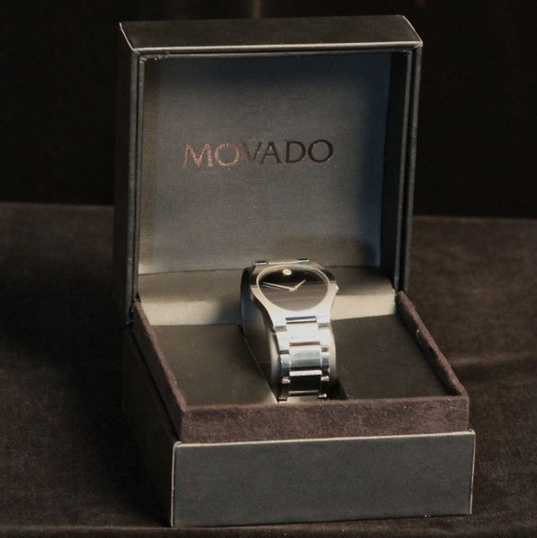 Movado Fiero Tungsten Carbide Men's Watch BARTH5: "Movado Fiero Tungsten Carbide Men's Watch BARTH5. As-Is Condition! XE105HS. One Movado Fiero Tungsten Carbide Men's Watch. Comes with original box and brochure, certificate of authenticity and extra
