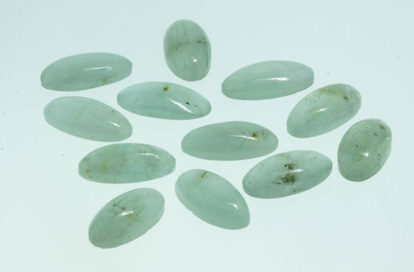 Natural Green Beryl Parcel (12) 35.98cts. A2284: "Natural Green Beryl Parcel (12) 35.98cts. A2284. Excellent Condition. GH13RD. Twelve oval cabochon cut natural Green Beryls. Exact total weight: 35.98cts. AIG appraised at $1,310.00. CA13NM. Thank yo