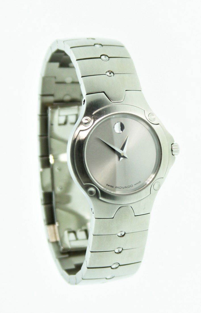 Movado Stainless Steel Wristwatch ED1063: "Movado Stainless Steel Wristwatch ED1063. Great Condition! MV181JX. One Swiss Movado made stainless steel wristwatch. Identified with marking of "MOVADO" on the clasp, this watch has class and style