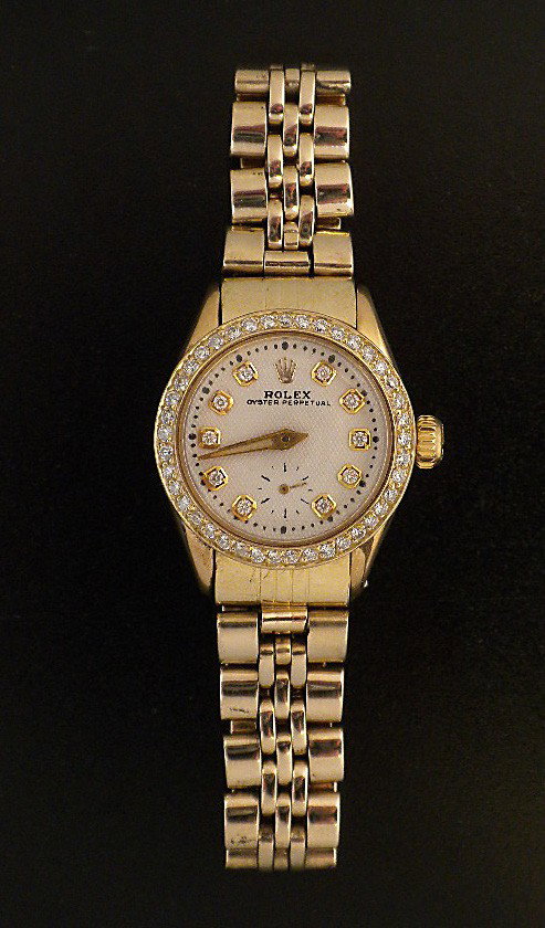 Gold Rolex Oyster Perpetual Wristwatch A2321: "Gold Rolex Oyster Perpetual Wristwatch A2321. Excellent Condition! GC1024UG. One ladies, hand crafted & machine milled Rolex Oyster Perpetual, ldel wristwatch electronically tested 14KT yellow gold, 
