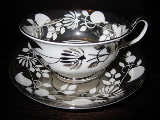 Royal Chelsea 1950's cup and saucer set BD79: "Royal Chelsea 1950's cup and saucer set BD79. Excellent Vintage Condition! WR62PL. Beautiful tea cup and saucer set. Made in England by Royal Chelsea. It's a 1950's Silver overlay "lusterware" pat