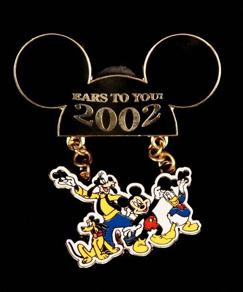 Disney Main Characters Collectors Pin NS137: "Disney Main Characters Collectors Pin NS137. Excellent Condition! SLKA. Disney main characters collectors pin featuring Pluto, Goofy, Mickey and Donald dangling from a Mickey Mouse hat which reads Ea