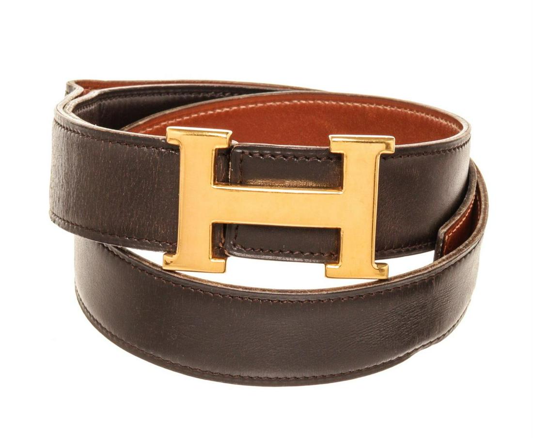 Hermes Brown Leather Constance Belt: Hermes Brown Leather Constance Belt with leather, gold-tone hardware and push lock closure.